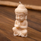 Bougie Buddha assis blanc en prière