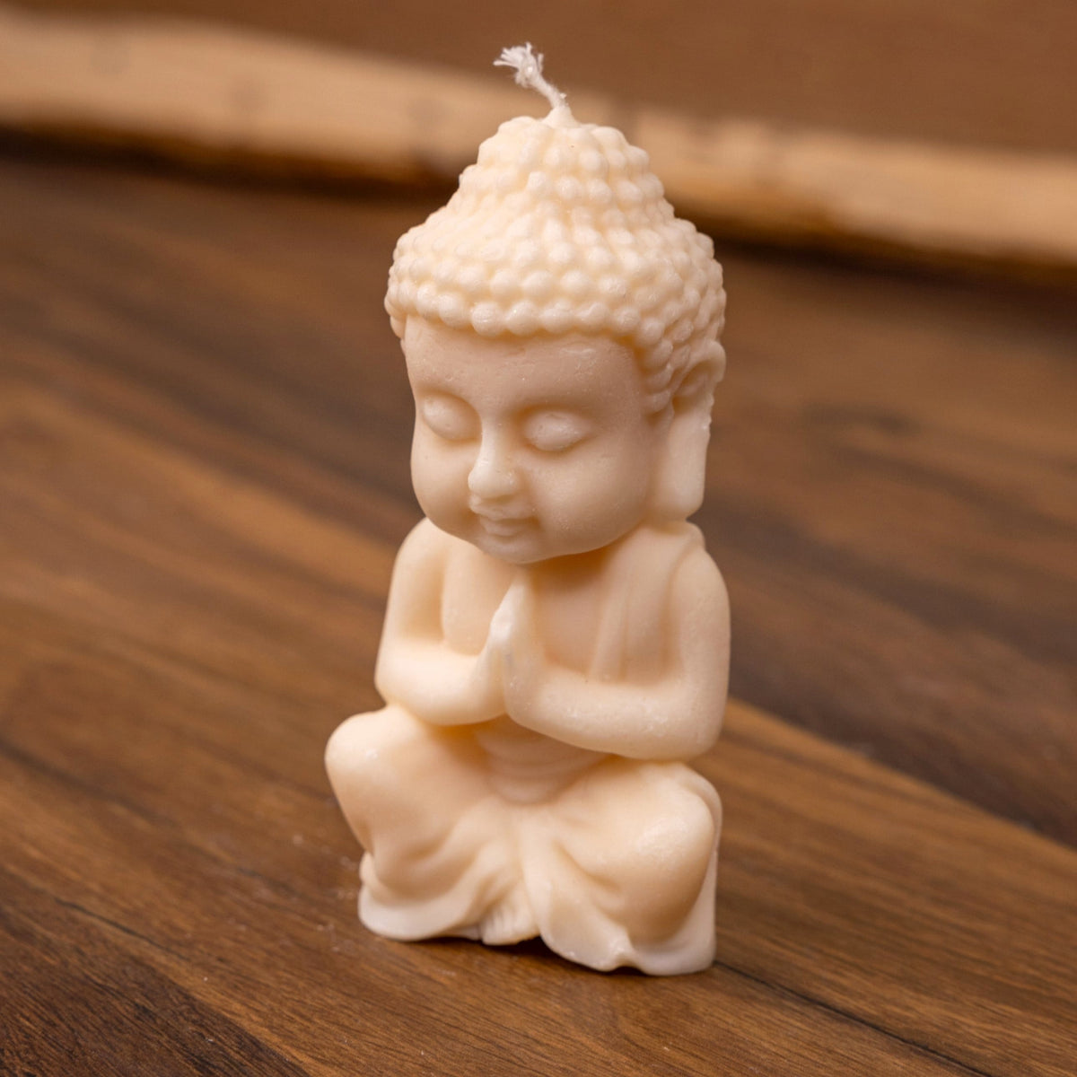Bougie Buddha assis blanc en prière