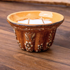 Bougie kougelhopf motif fleur marron en poterie de Soufflenheim, La Bougiterie