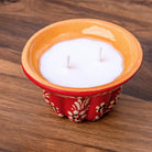 Bougie kougelhopf motif fleur rouge en poterie de Soufflenheim, La Bougiterie