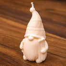 Bougie lutin de Noël ski – gnome scandinave en cire avec ses skis