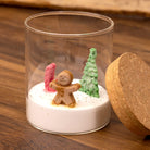 Bougie verrine scène de Noël bonhomme pain d'épices, sucre d'orge et sapin